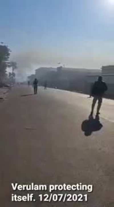 South Africans protecting their cities against current riots and looting