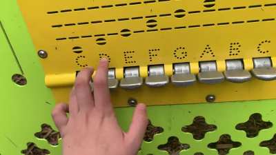 Playing &ldquo;Never Gonna Give You Up&rdquo; on a children&rsquo;s piano/keyboard in a public park