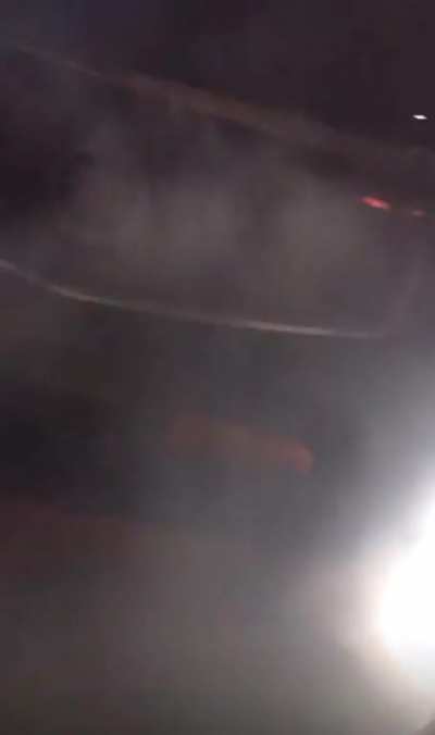 Dude drifts car until it lights on fire