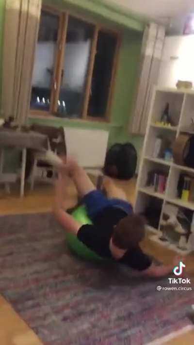 Practicing a move on an exercise ball