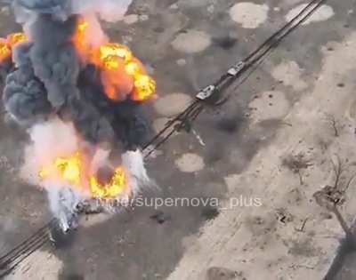 The lead armored Russian vehicle in a convoy explodes, unknown place/date.