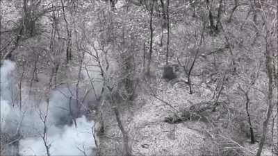 Ukrainian FPV drone hits the ground and slings a part of the warhead at a Russian soldier far away. Location unknown, February 2026