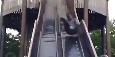 going down a slide meant for children