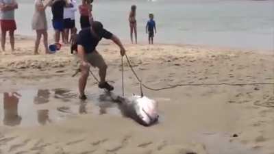 Psychos pull a shark out of the sea and suck all of the water from it so he can die faster