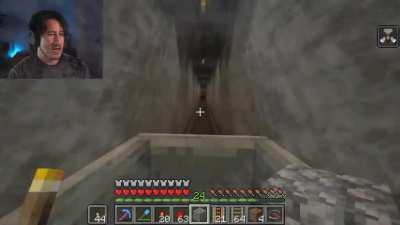 Mark riding a mine-cart in Minecraft, but he crosses into the Deep-Note dimension, except it was just probably a fever dream.