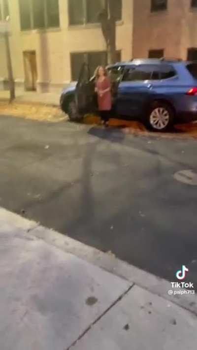 Lady gets mad because she was caught backing up into someone&rsquo;s car