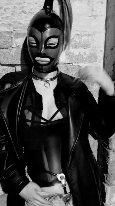 The pet dressed in latex during an evening walk and caught in the chastity belt