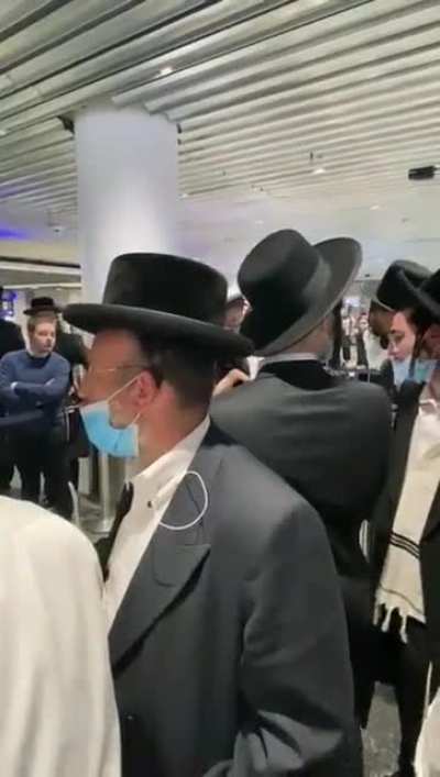 German police officer loses his cool on a bunch of Jews: Who said the N Word?