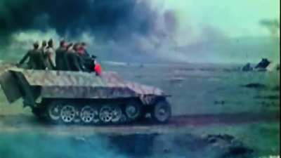 German Half track Assault , ( 1944 late war ??? ) . Original color footage .
