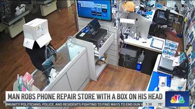Florida Man Robs Phone Repair Shop Wearing a Box on Head with No Eye Holes, Cannot See and Has to Lift off Box, Leading to His Identification and Capture