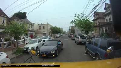 BMW driver threatens to kill a school bus driver with a bus full of children. (Part two in the comments)