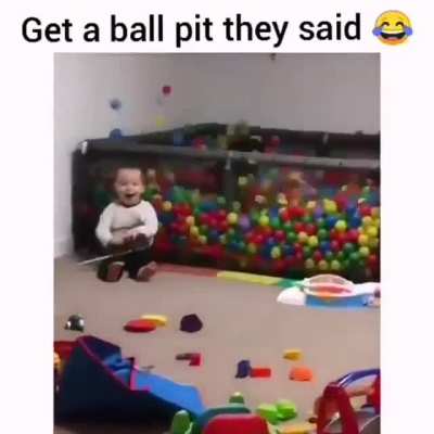Having fun in the ball pit