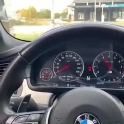 Showing off his car
