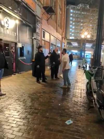 Guy trys to fight bouncer outside of Seattle nightclub
