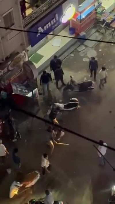 The man was slashing random people on the street with a machete. The police arrive to "de-escalate"