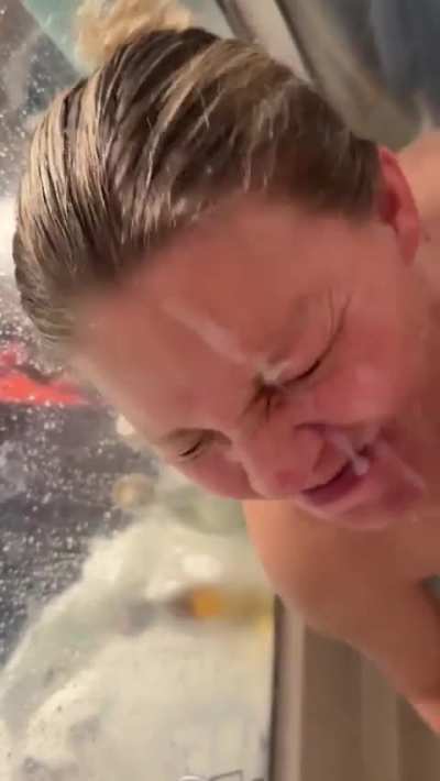 Slut taking a thick load down her chin