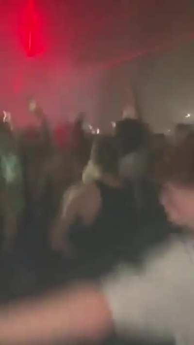 Fan does a back flip on cue with the beat drop at a Playboi Carti concert. Crowd goes wild