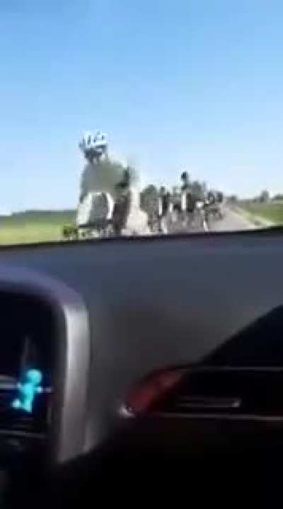 Cyclists crashing into parked car