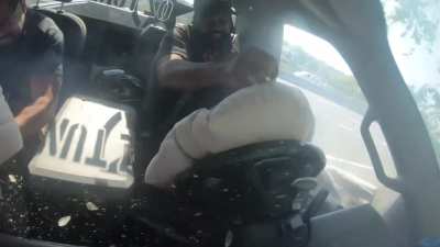 Holding the steering wheel like a dumbass - OUCH!