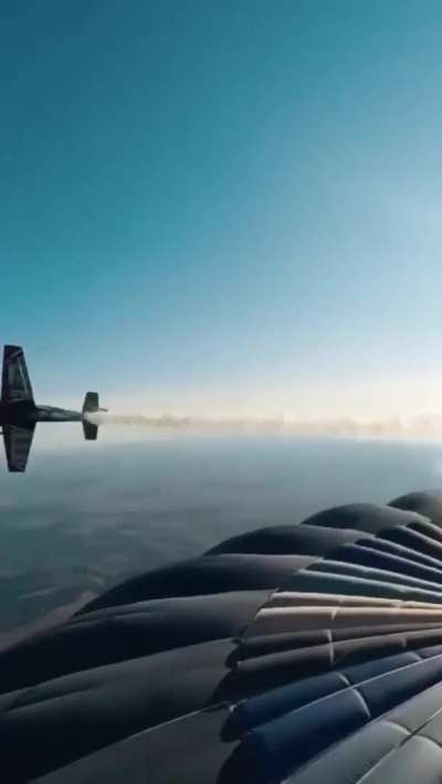 Aleksandr Marushk, a Wingsuit and base jump coach, Drinking coffee on the top of a hot air balloon