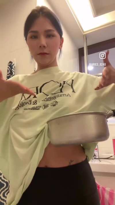 Pot held under tit