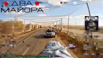 70th Division Fiber-Optics FPV drones lying in ambush strikes on enemy SUV with infantry inside the anti-drone corridor.