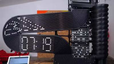 Creator ivan miranda made a clock that tells time with black &amp;amp; white marbles