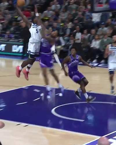 Minnesota Timberwolves Anthony Edwards dunks over Utah Jazz John Collins