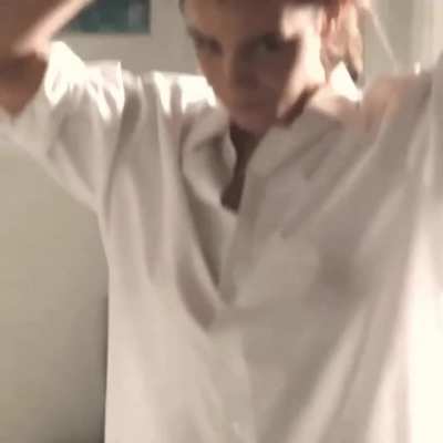 Emma Watson wearing nothing but a white shirt