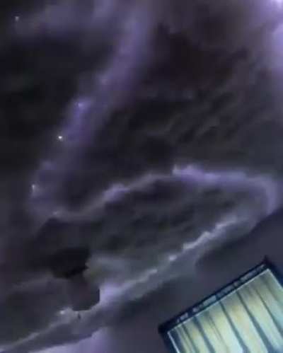 Found on Linked In. A ceiling made to look as tho you are outside during a bad storm, using cotton batting and strings of lights, which are synced to storm sounds. Not my actual room tho.