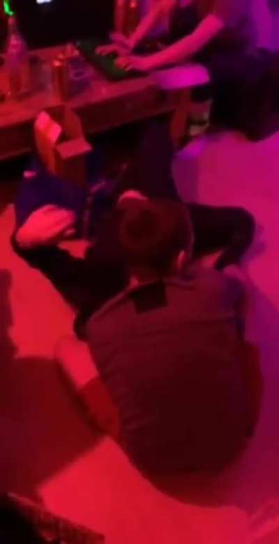 Drunk and sparing on a concrete floor not the best idea unfortunately his back and neck were killing him for a few months afterwards
