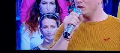 French mask wearing TV contestants are weird and creepy