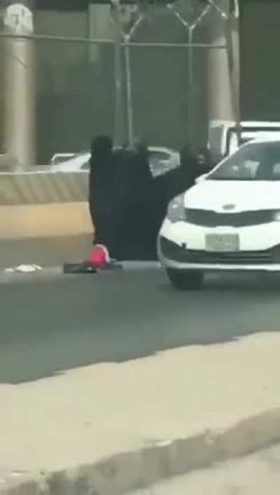 Womens in Burka busy with each other, Child thinks "Why am I here"