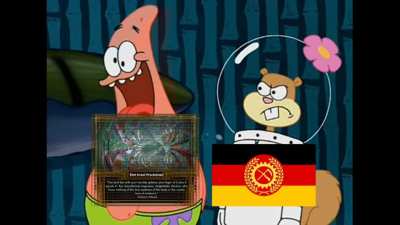 Le Patron explaining the meaning of 