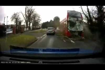 Double Decker Bus getting hit by a tree. Storm Eunice
