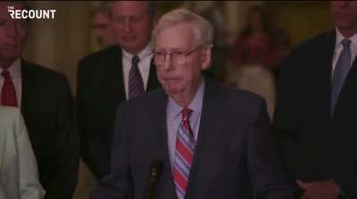 Mitch McConnell begins presser then suddenly stops for 20 seconds and appears to be unable to continue speaking, before being escorted away by Republicans