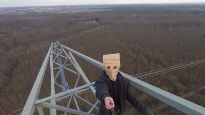 high voltage tower, 300ft above the ground.