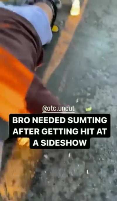 Man pulls out a gun after being struck by a car during a sideshow