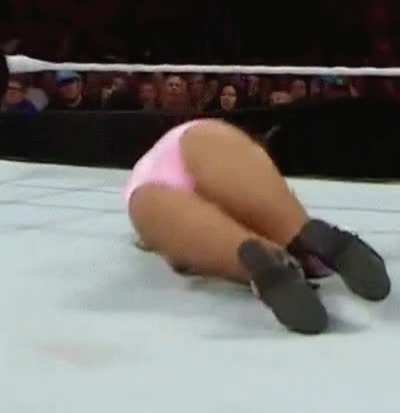 Nikki Bella hits the mat hard and shows off that ass