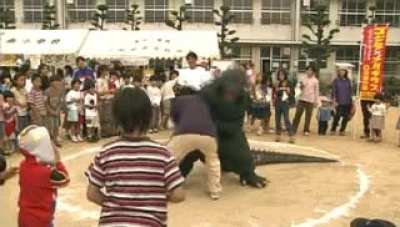 Damn, Godzilla is participating sports such as Sumo
