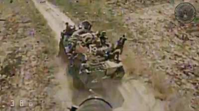 Ukrainian FPV drone attacks a Russian armored personnel carrier with infantry on the Kinburn Spit