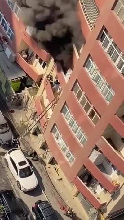 Person falls from a ladder trying to escape the fire
