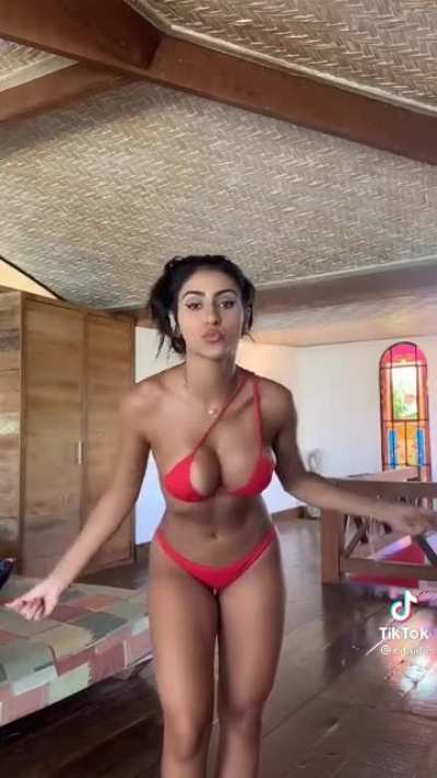 Jumping in her bikini 🔥