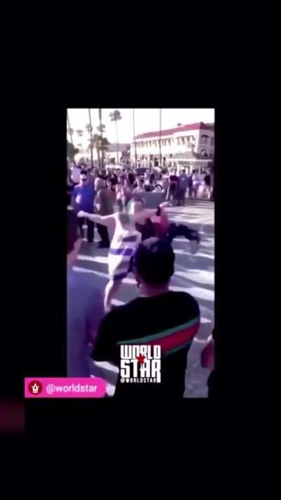 Racist lady gets beat up for saying the N word