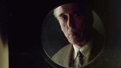 Christopher Lee reenacting the kitchen scene from Jurassic Park
