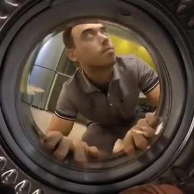 Just a guy doing some laundry as usual.