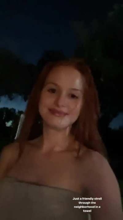 Madelaine Petsch walking around with just a towel on