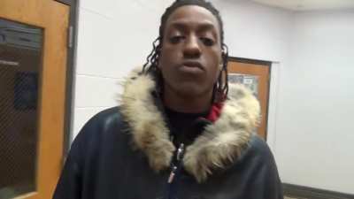 Rico Ricklezz aka Ronnie moe in school with his gun