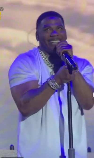 Nelly high on stage