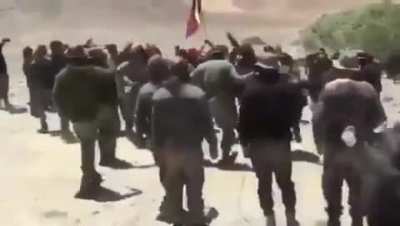 Tibetans who are part of India's secretive Special Frontier Force, celebrate with Tibetan flag after successfully taking over one of the China's strategic posts in the Ladakh area disputed between India &amp;amp; China.